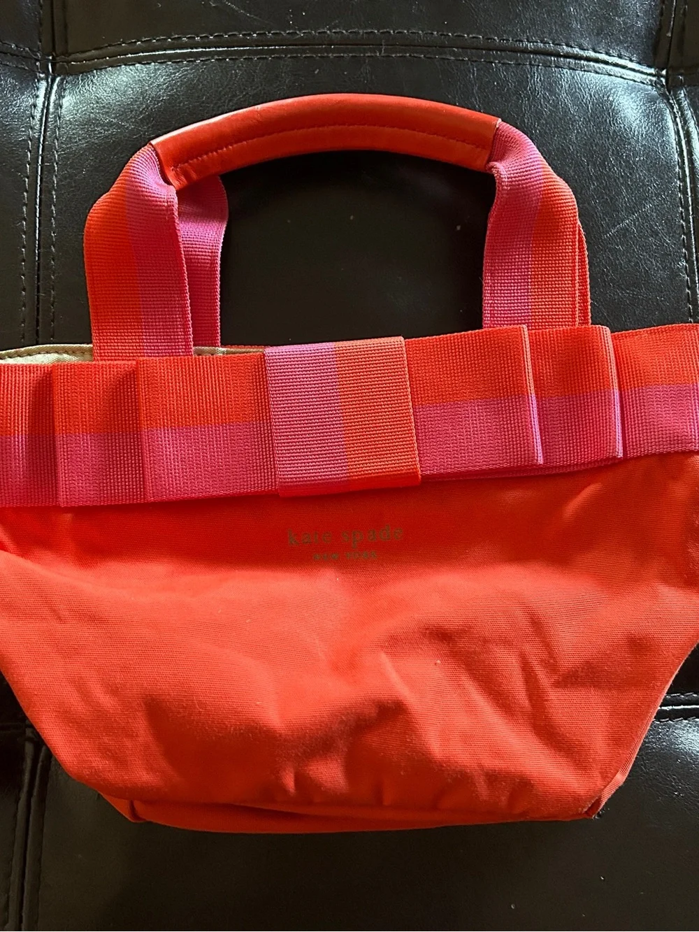 kate spade Orange handbag with Pink Trim